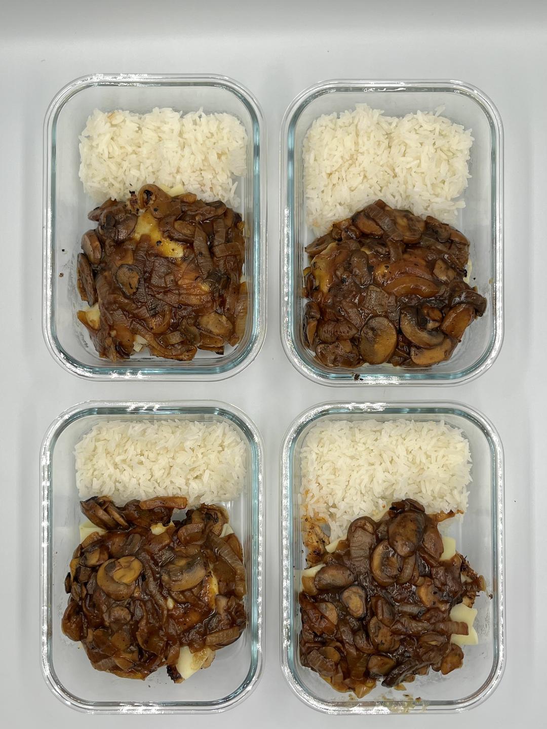 Four prepared servings of French Onion Smothered Pork Chops