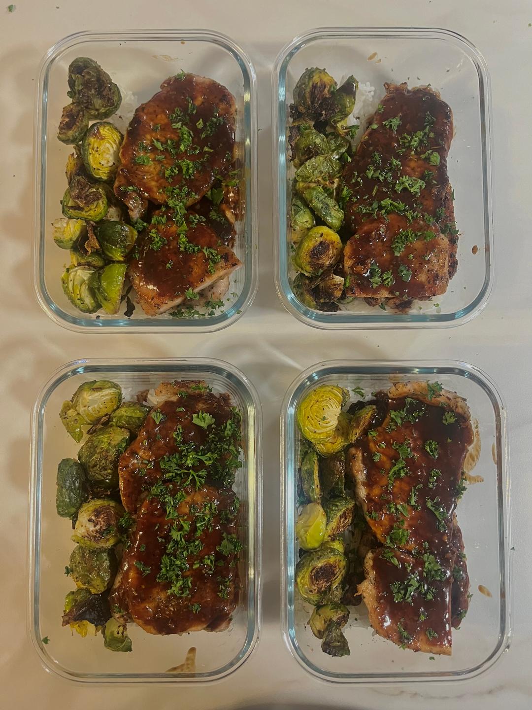 Four prepared servings of Garlic Balsamic Pork Chops