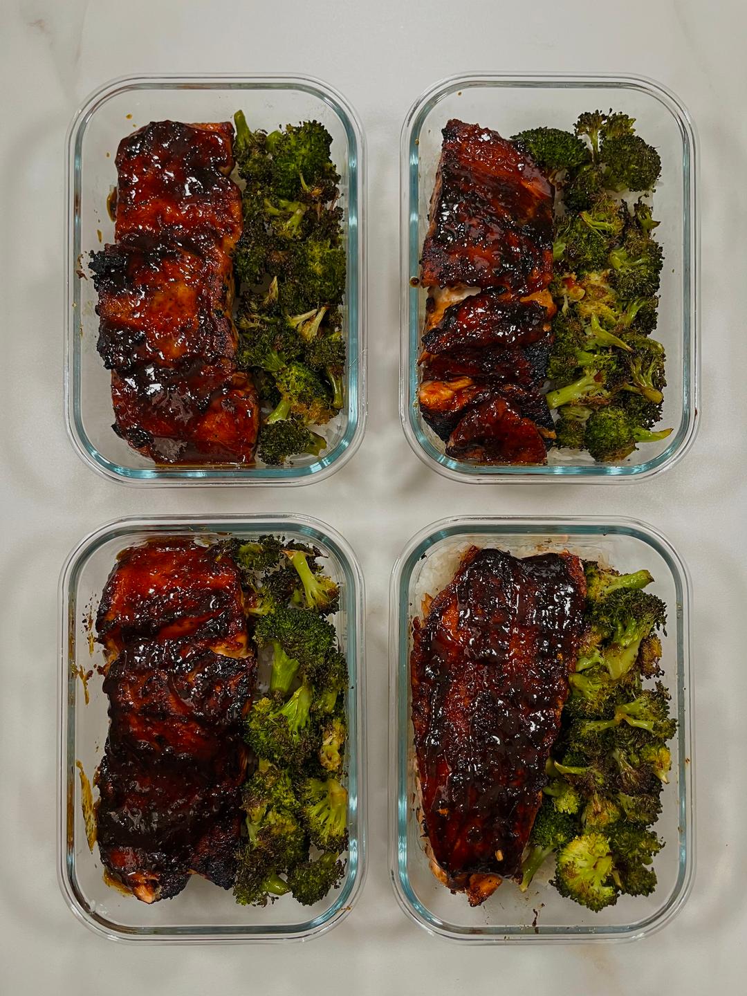 Four prepared servings of Honey Sriracha Glazed Salmon