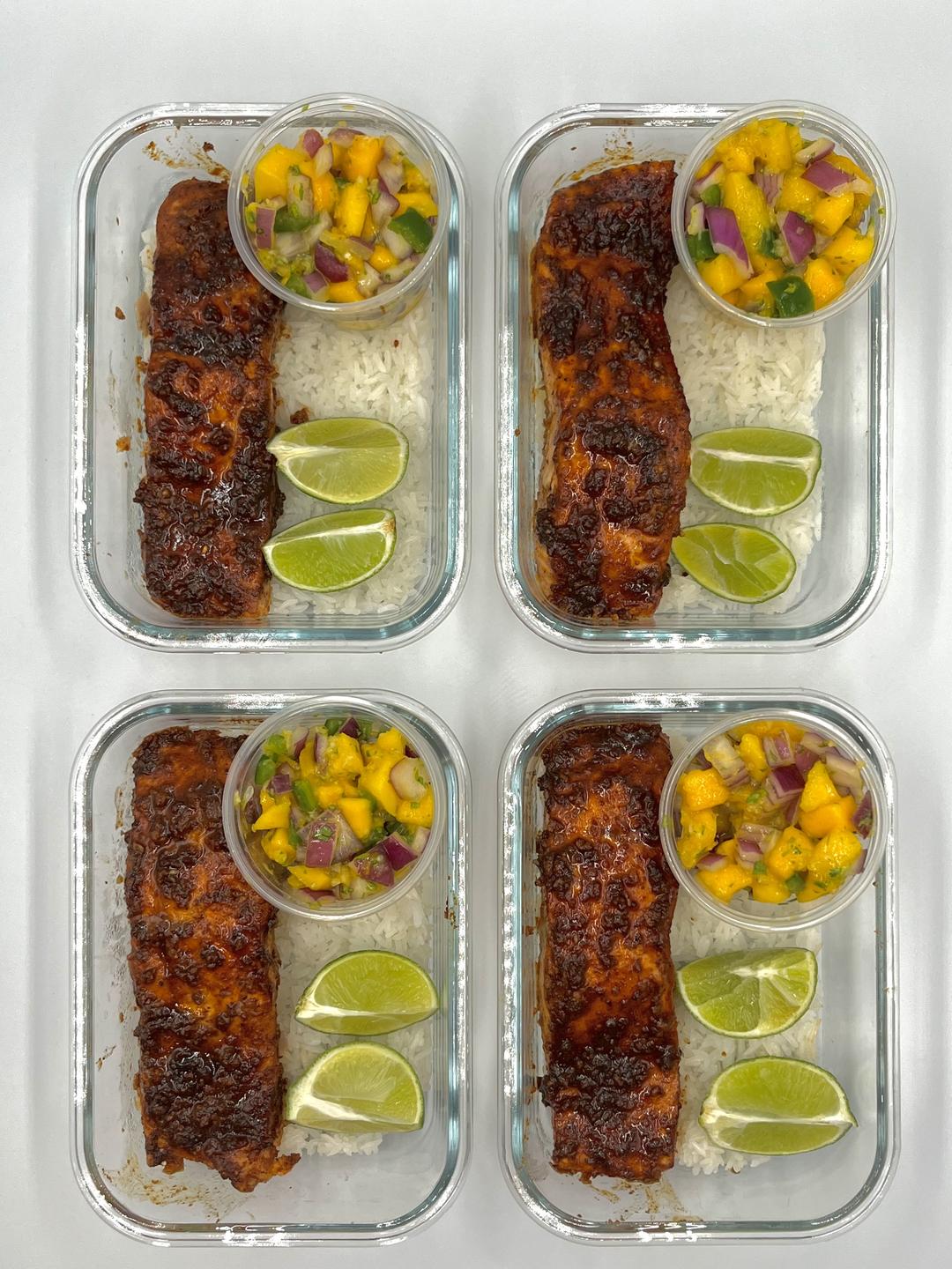Four prepared servings of Salmon with Mango Salsa