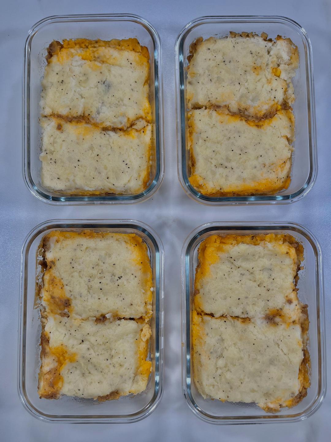 Four prepared servings of Shepherd's Pie