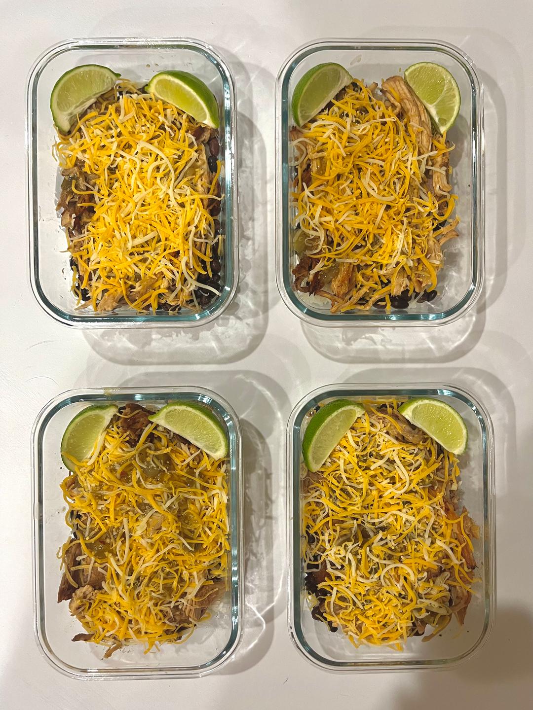 Four prepared servings of Slow Cooker Carnitas Bowls