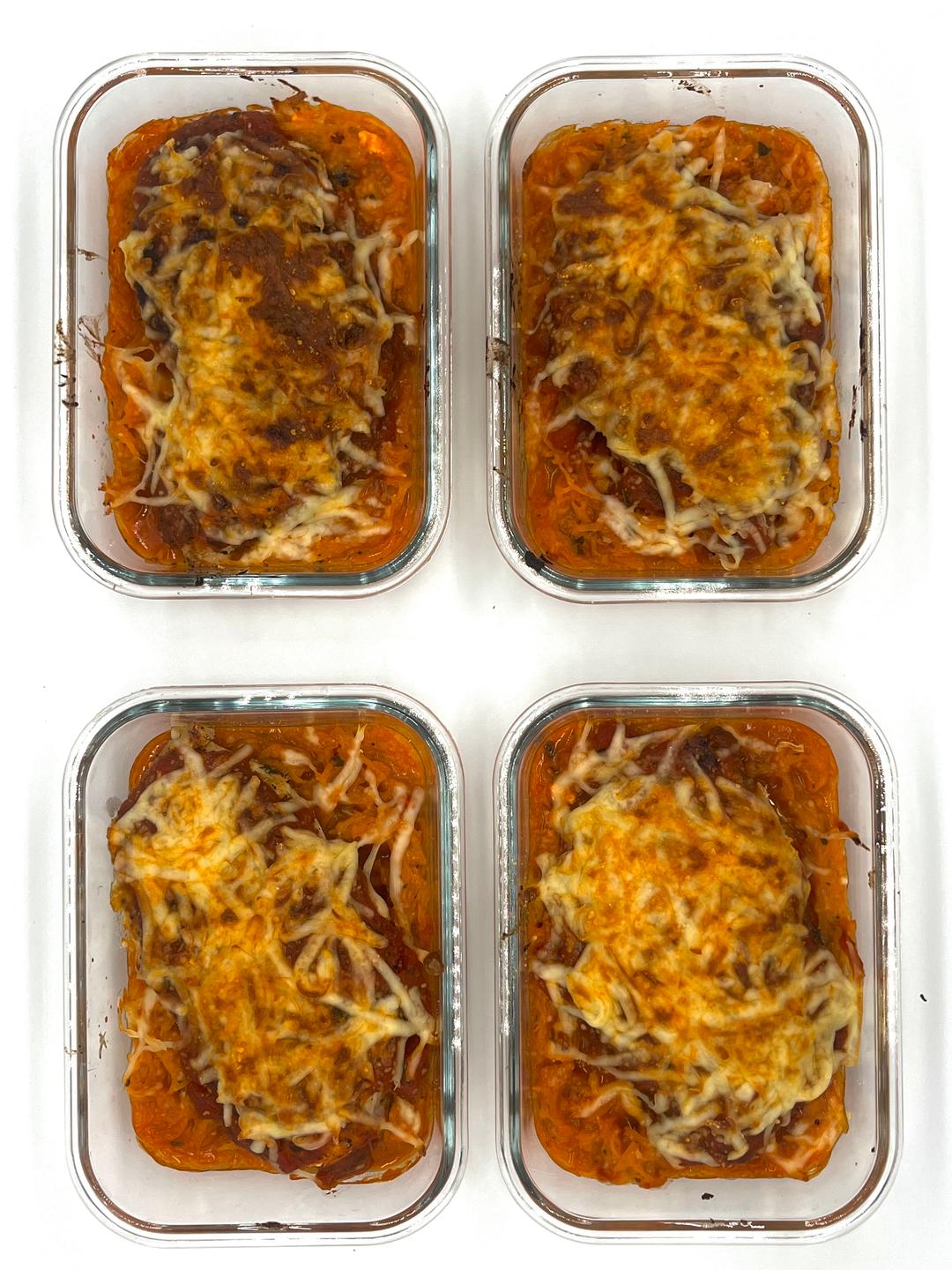 Four prepared servings of Spaghetti Squash Chicken Parm