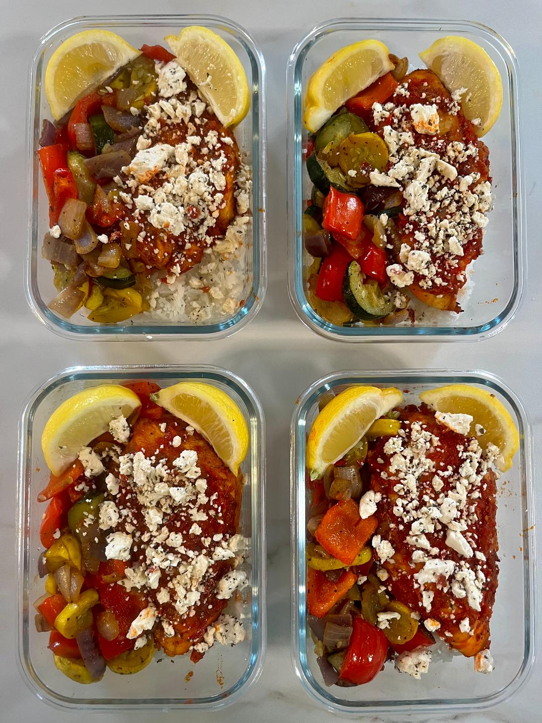 Four prepared servings of Spicy Harissa Chicken