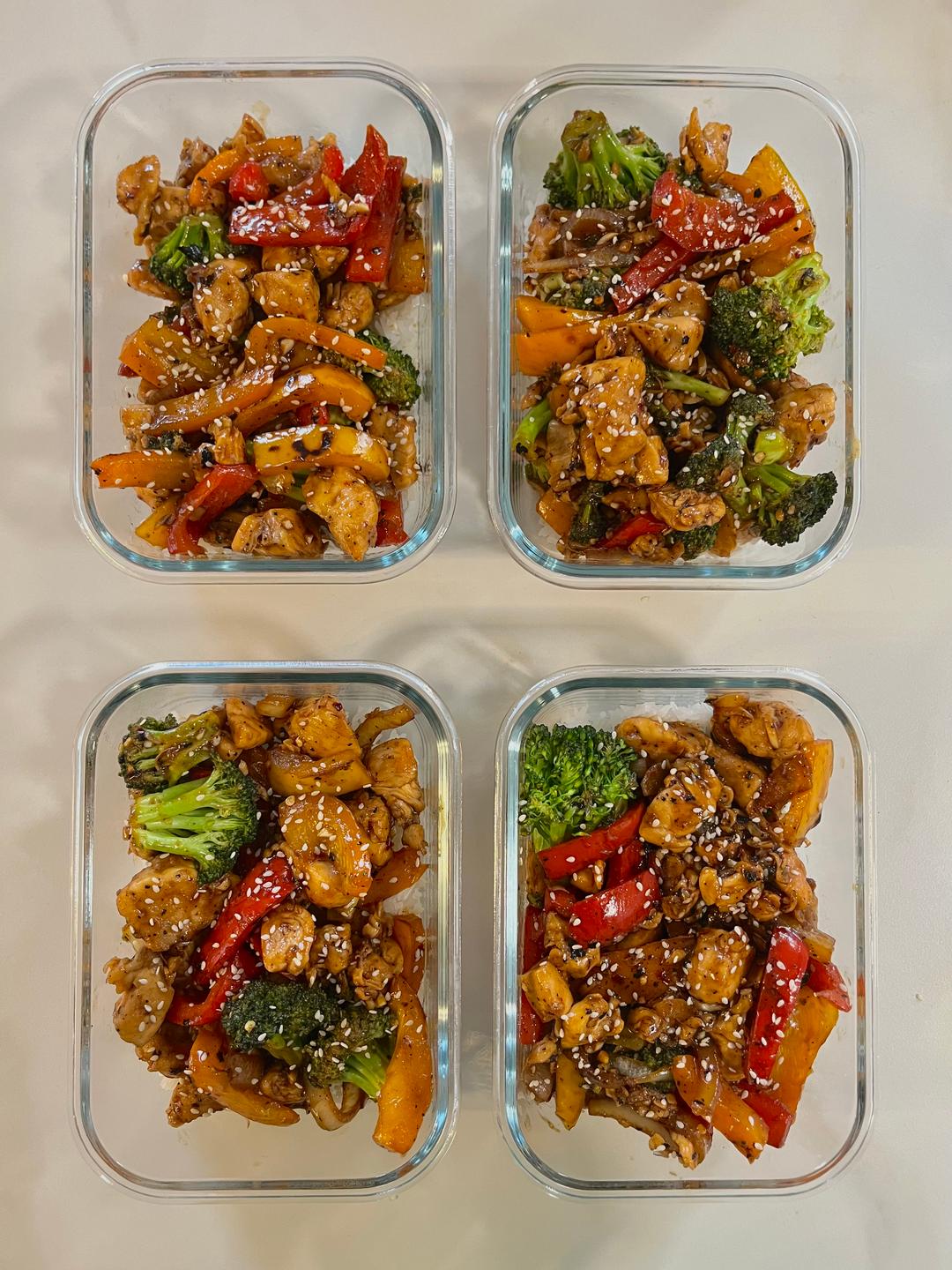 Four prepared servings of Sweet Garlic Chicken Stir Fry