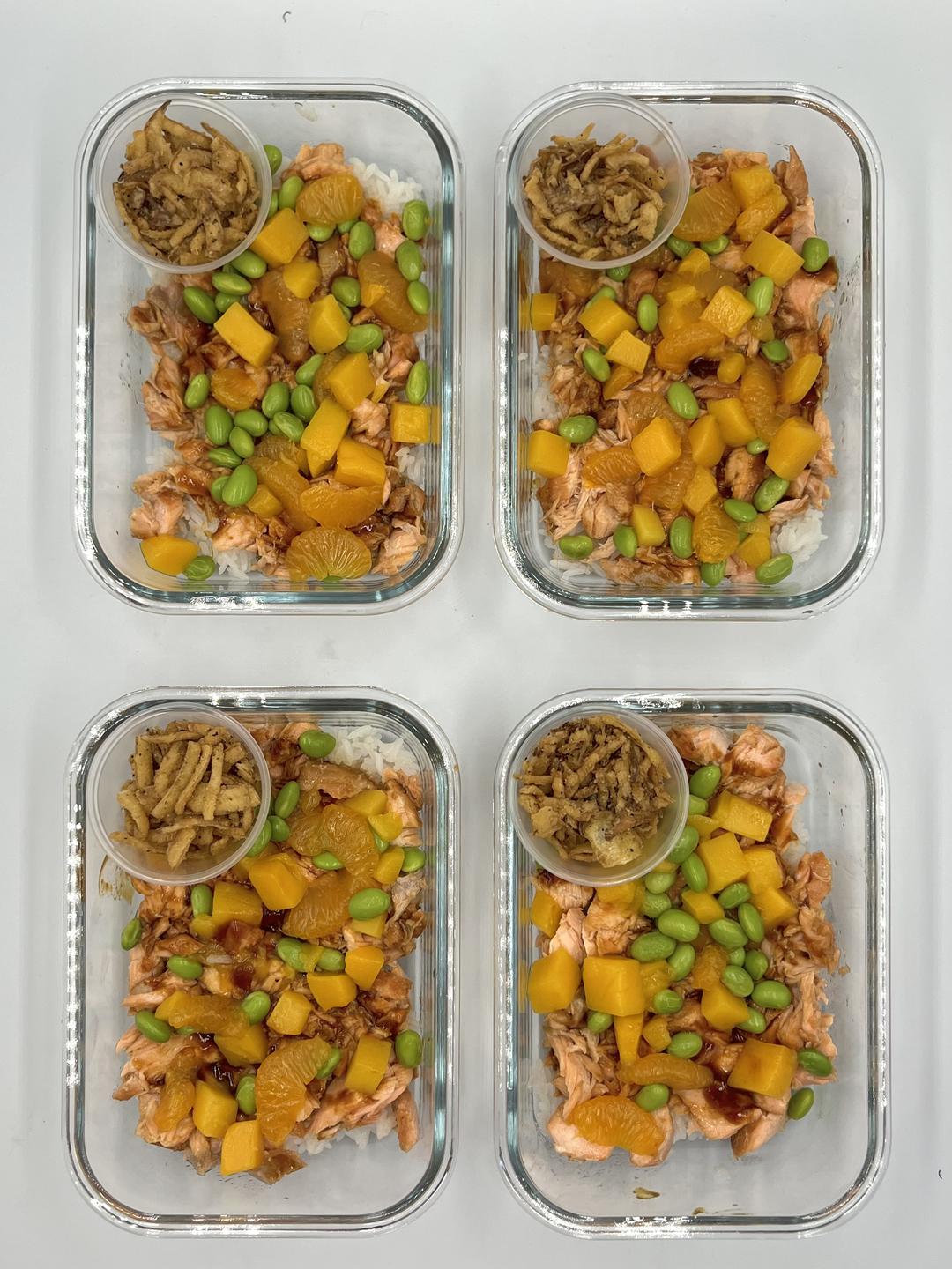 Four prepared servings of Tropical Protein Poke Bowl