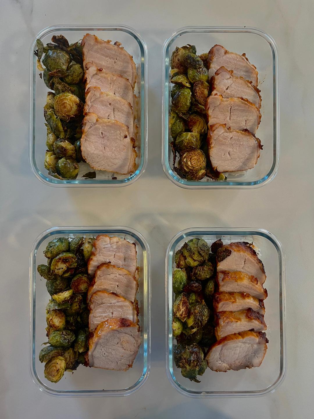 Four prepared servings of Balsamic Dijon Herb Pork Tenderloin