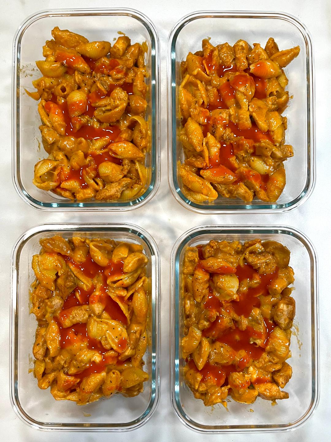 Four prepared servings of Buffalo Chicken Gouda Mac & Cheese
