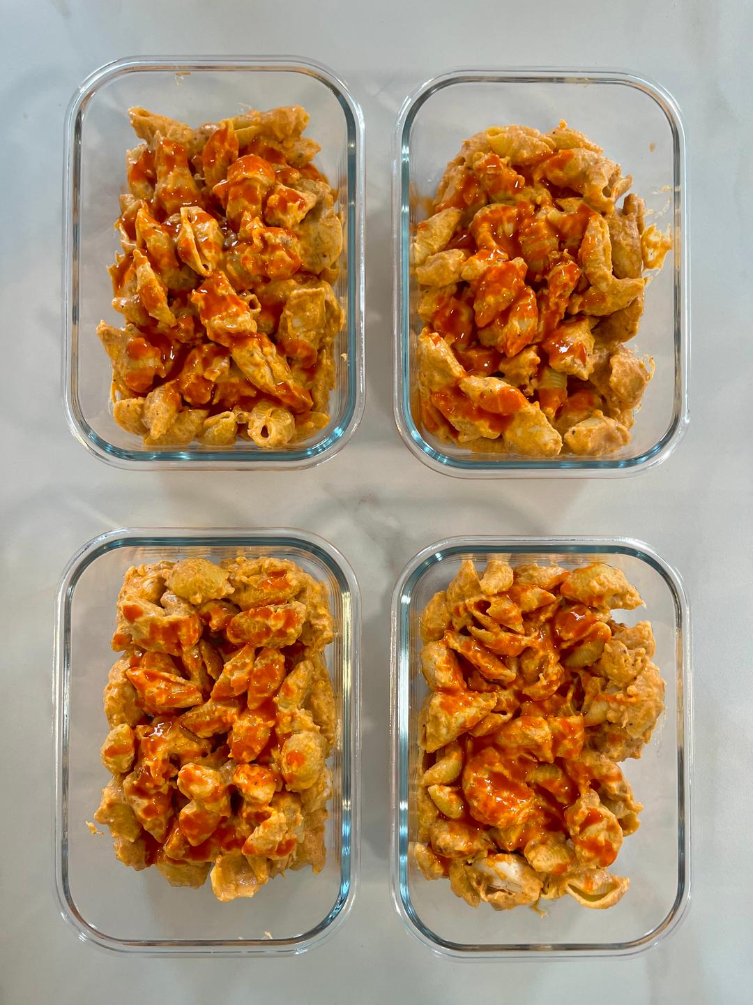 Four prepared servings of Buffalo Chicken Mac & Cheese
