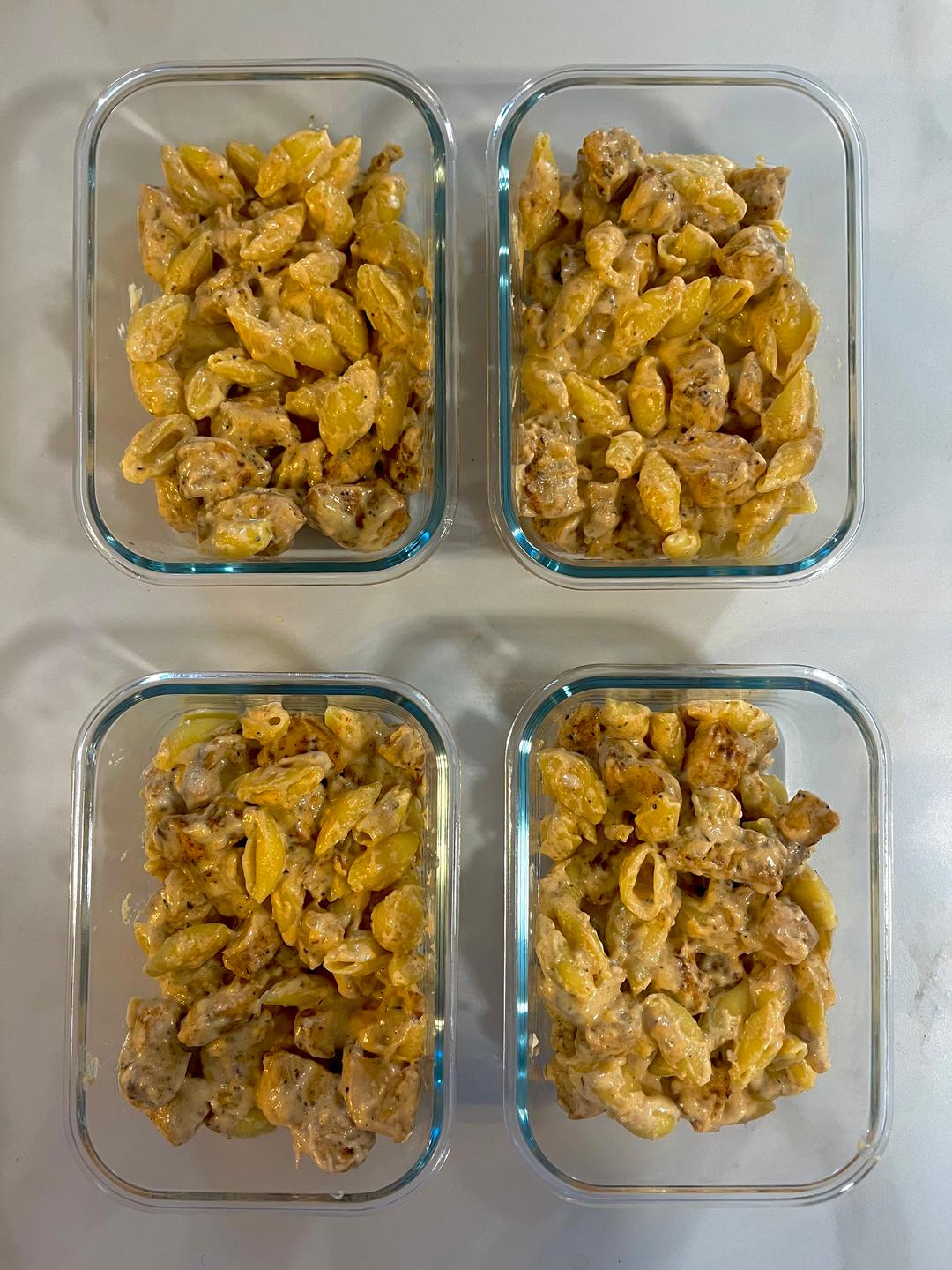 Four prepared servings of Cajun Chicken Mac & Cheese