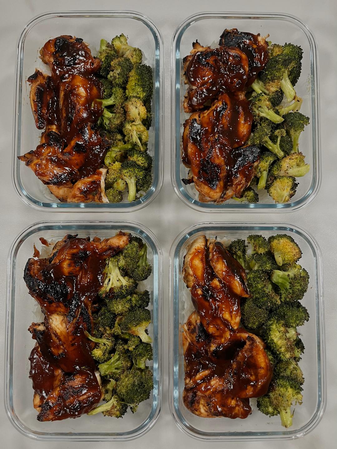 Four prepared servings of Charred Barbecue Chicken