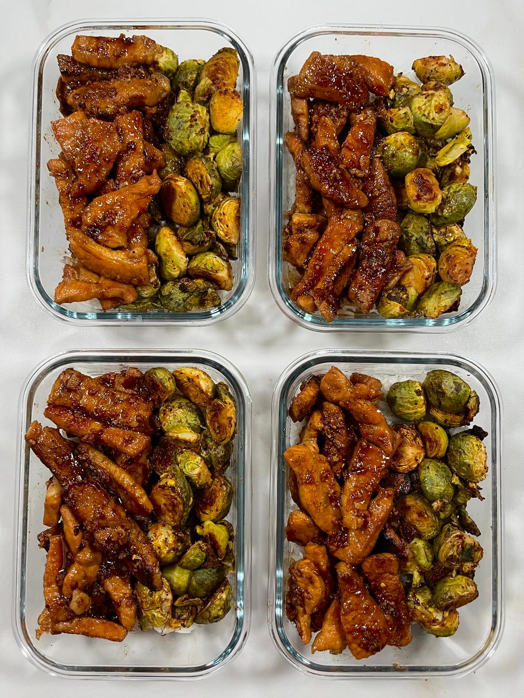 Four prepared servings of Honey Garlic Pork