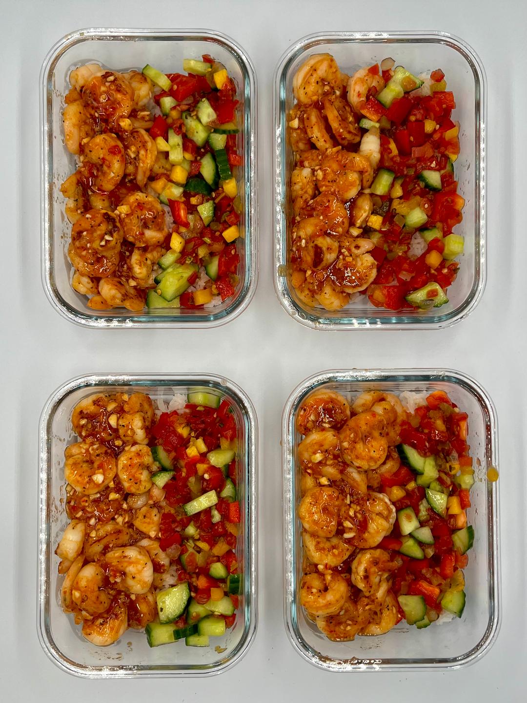Four prepared servings of Mango Chili Shrimp