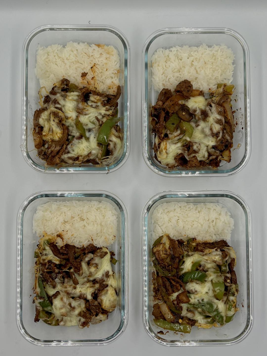 Four prepared servings of Philly Cheesesteak Bowl