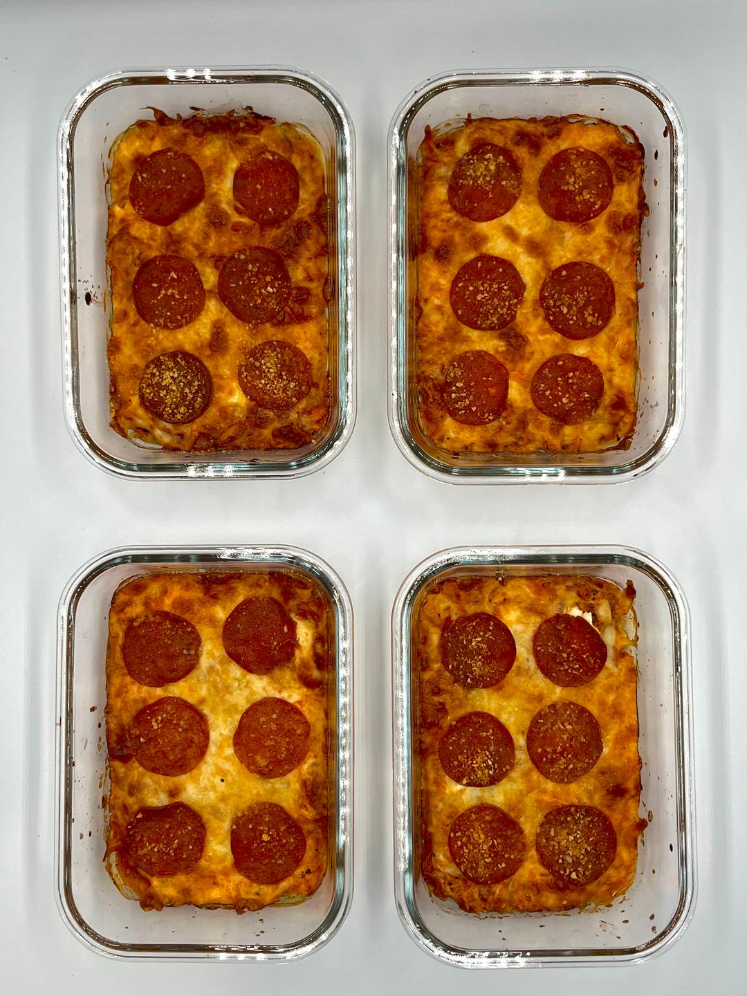Four prepared servings of Spicy Chicken Pizza Bake