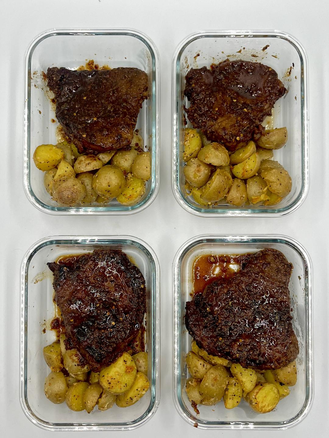Four prepared servings of Cajun Butter Steak