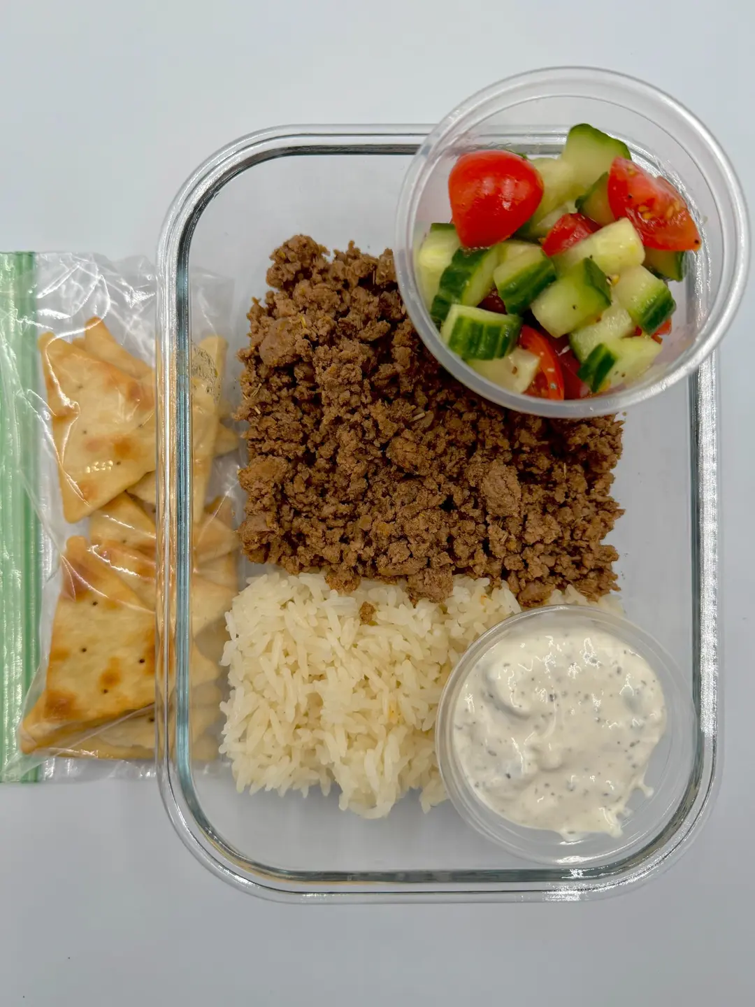Four prepared servings of Deconstructed Mediterranean Bowls