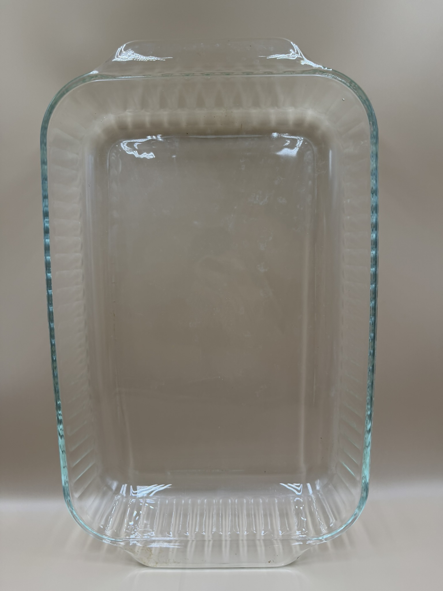 A clear glass 9-by-13-inch baking dish