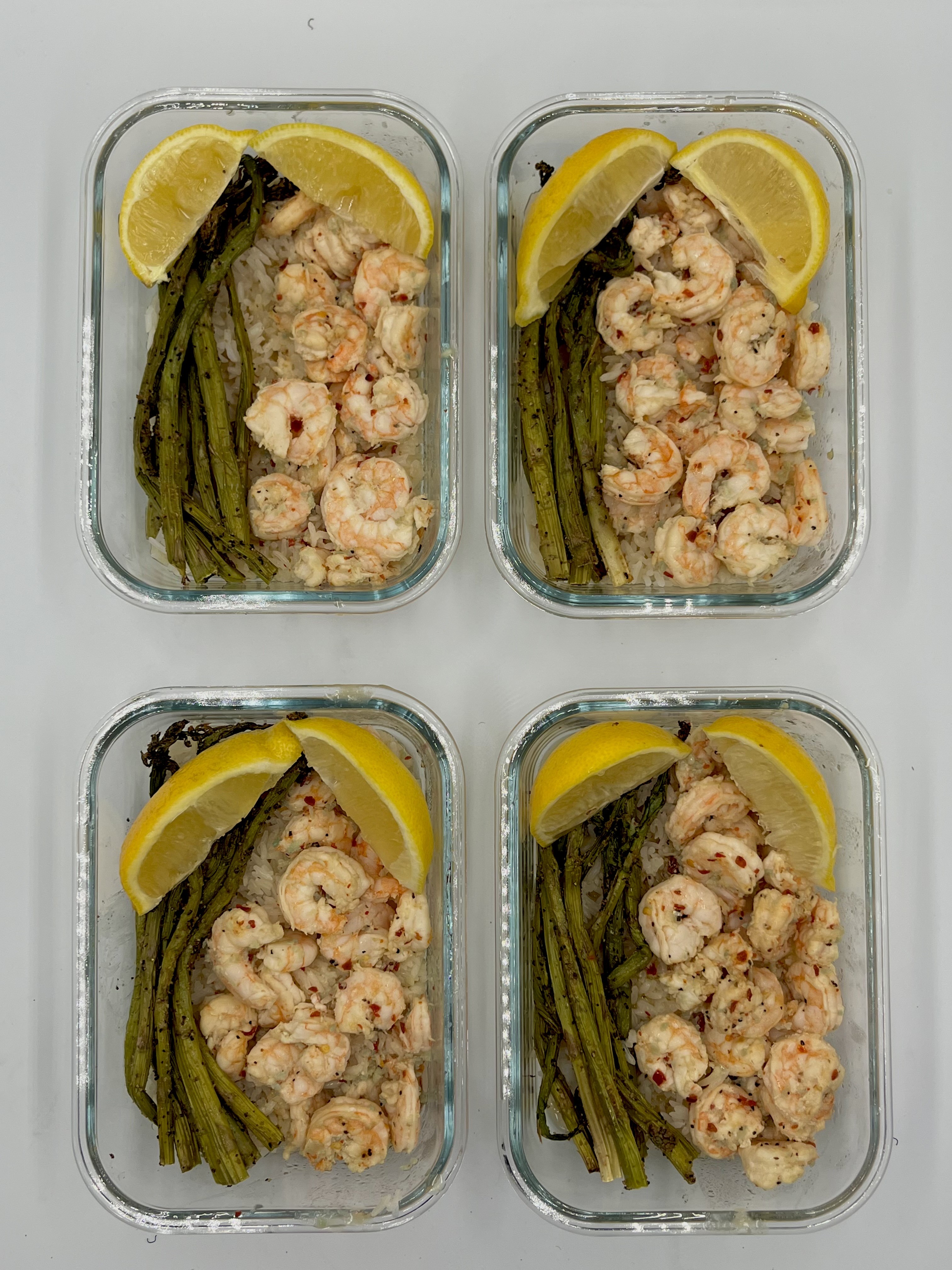 Four prepared servings of Garlic Lemon Butter Shrimp