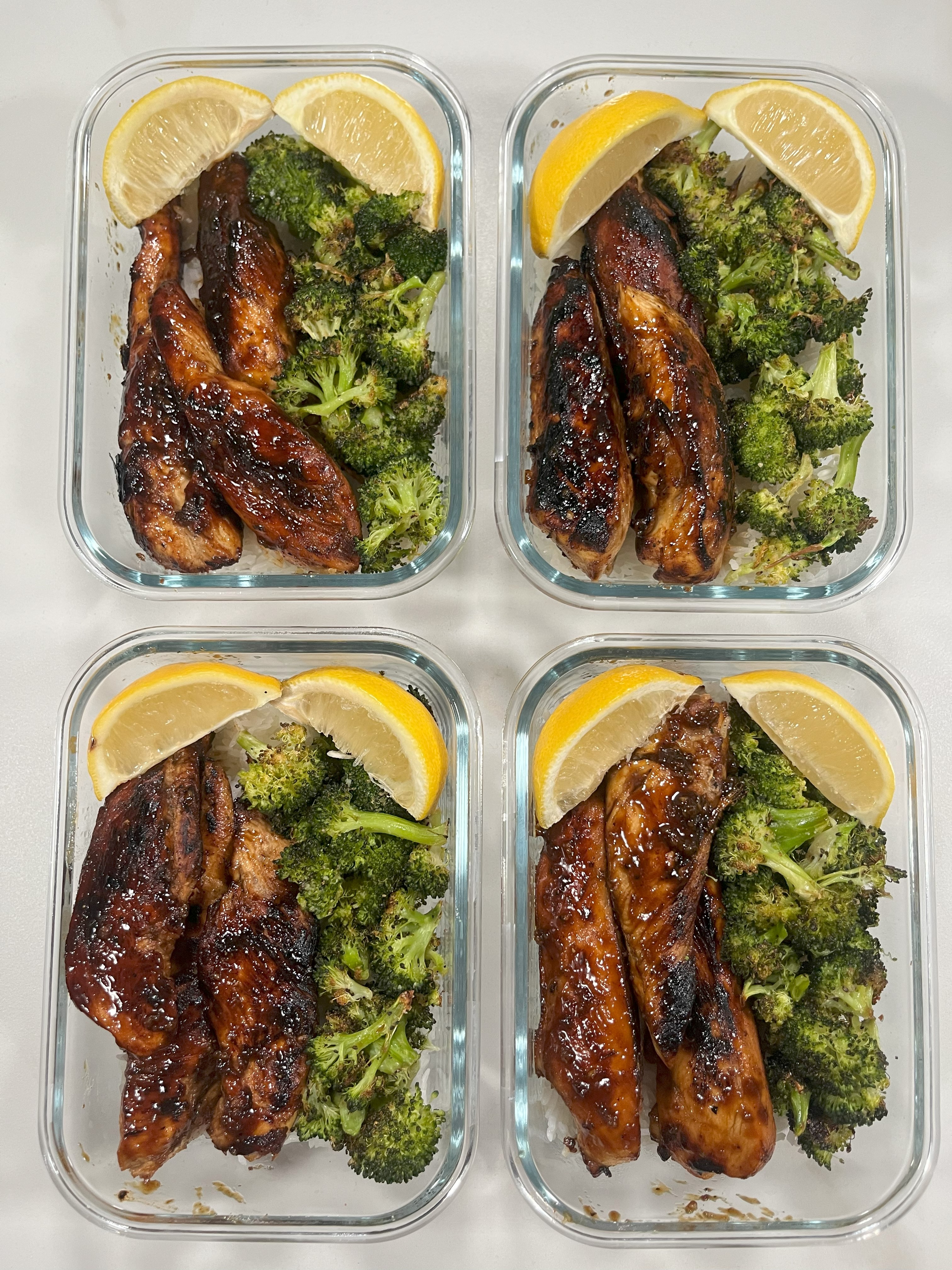 Four prepared servings of Honey Lemon Glazed Chicken