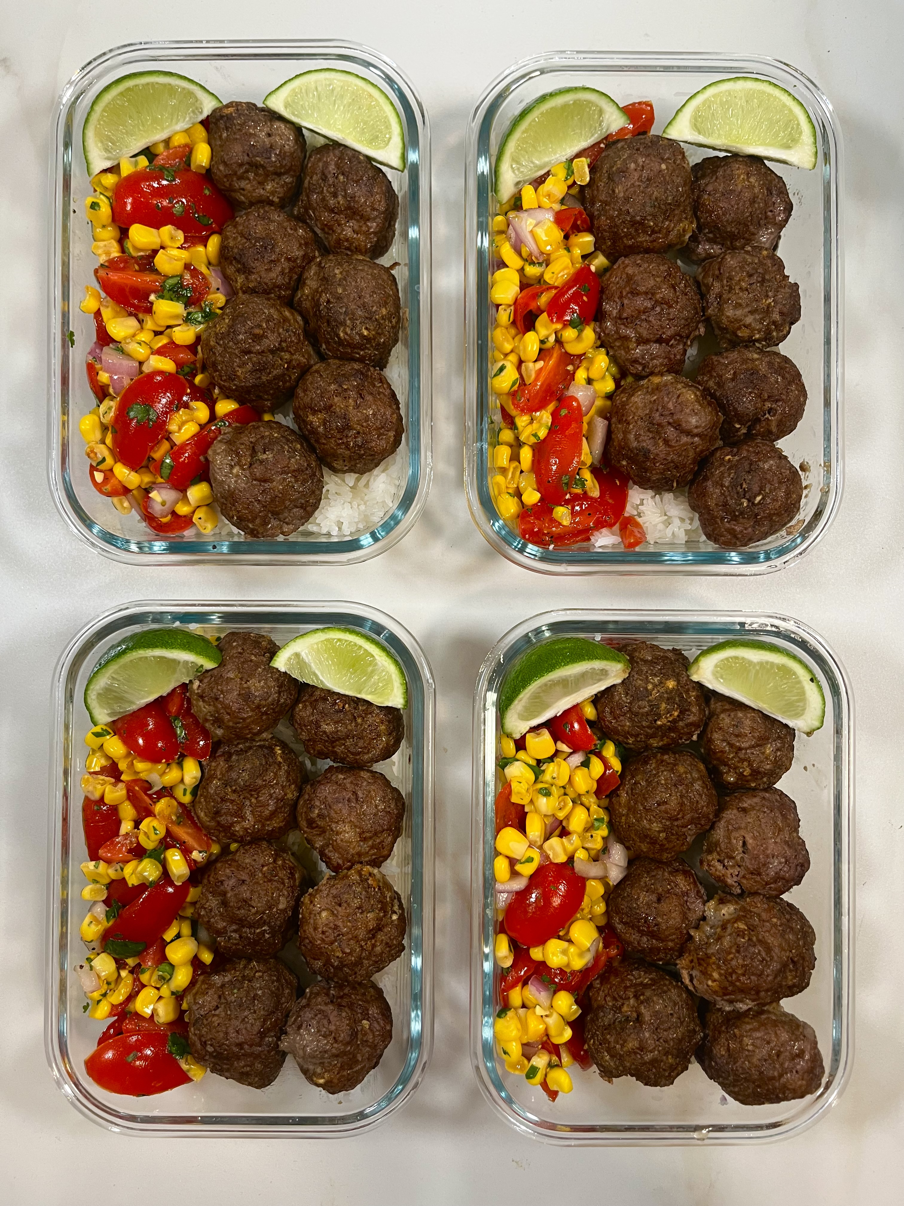 Four prepared servings of Mexican Meatballs