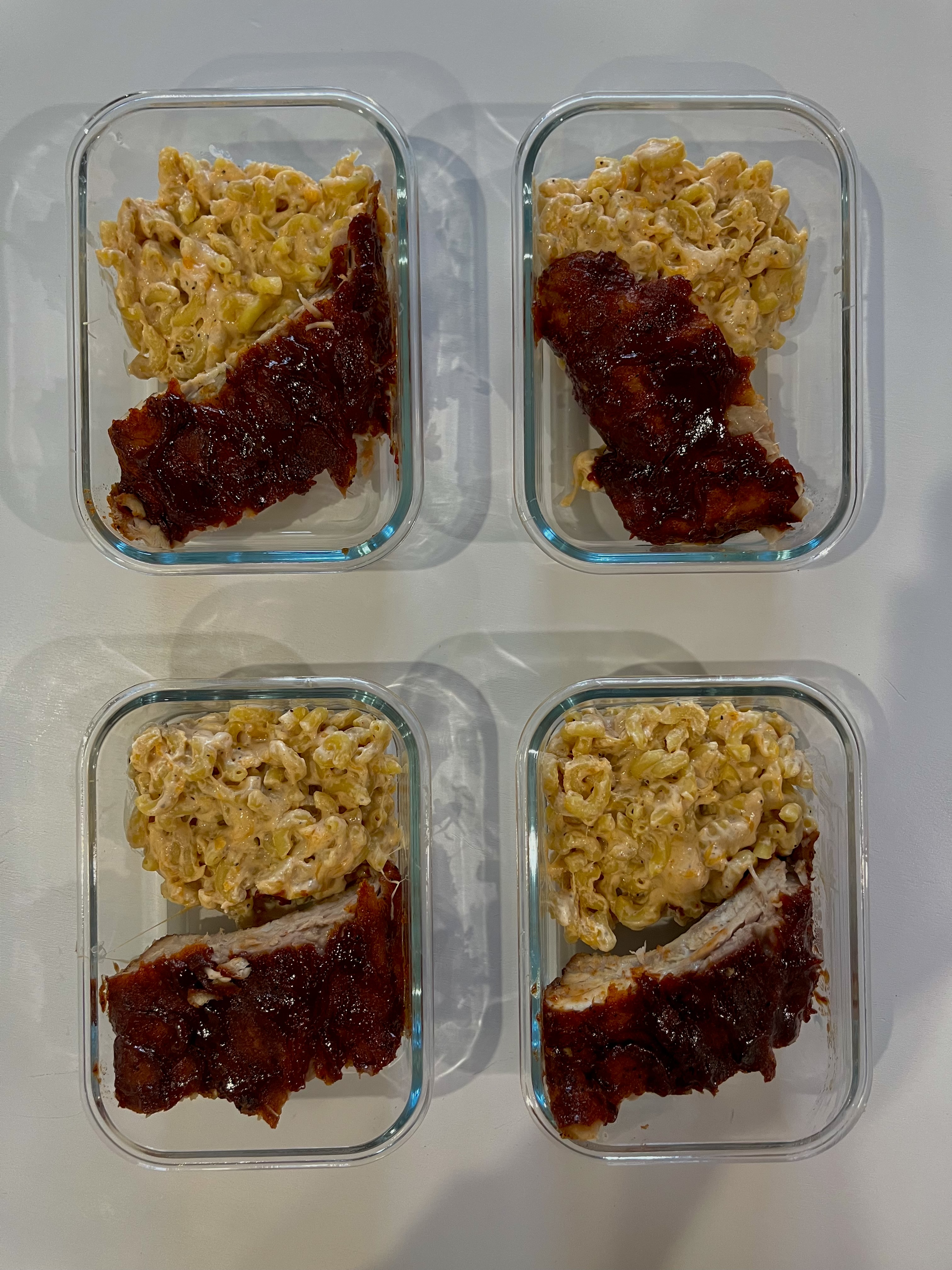 Four prepared servings of Ribs & Mac